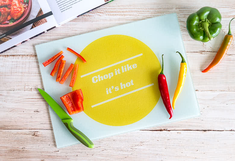 Personalised cutting board with a large yellow circle and the text "Chop it like it